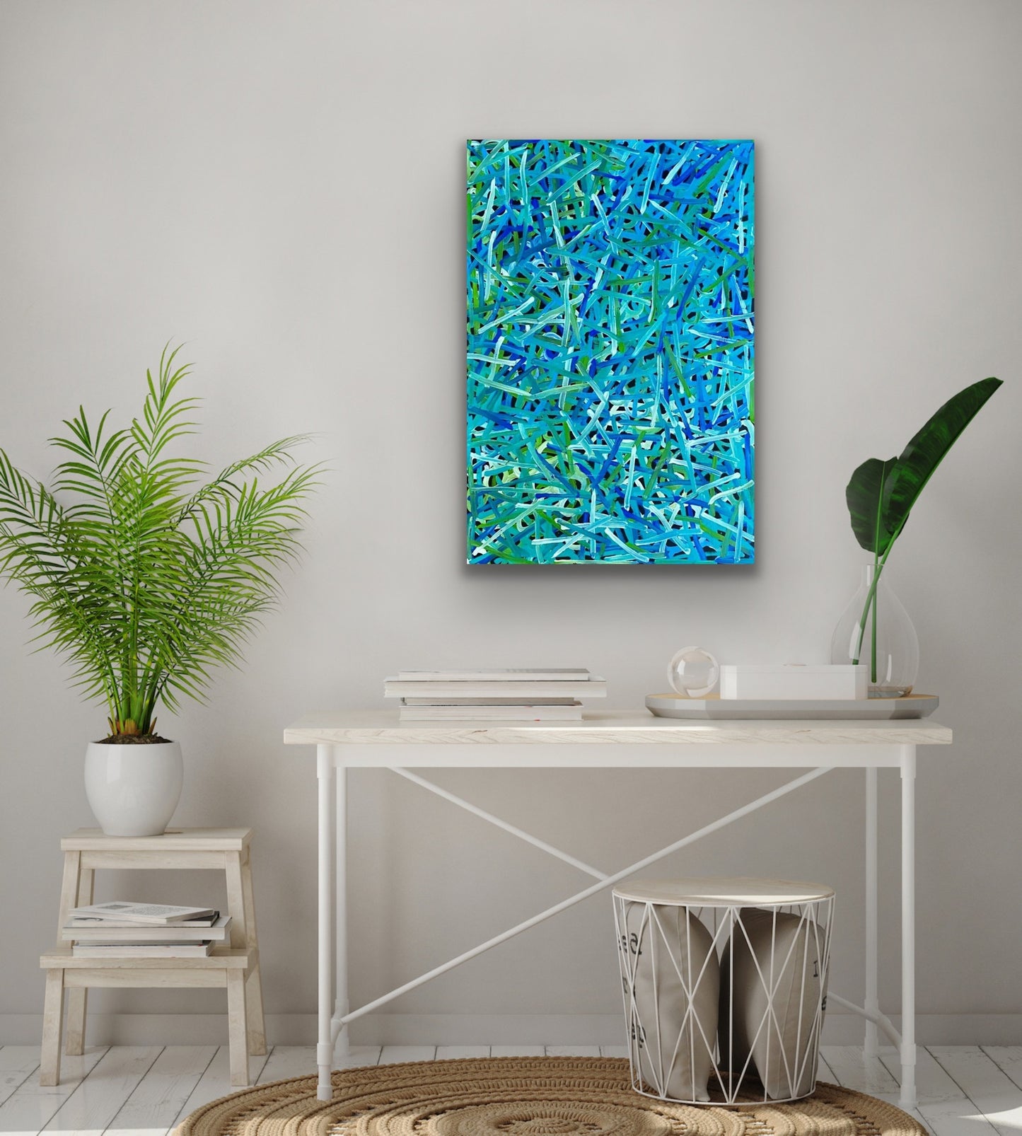 A painting by Betty Club Mbitjana in predominantly blue and green hues.