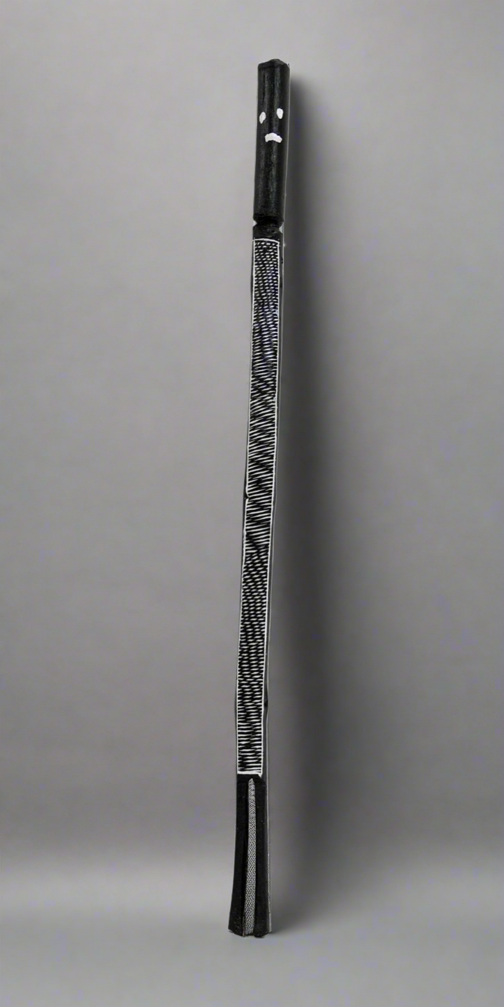 Black and white Mimih Spirit wooden sculpture by Kayleen Namundja.