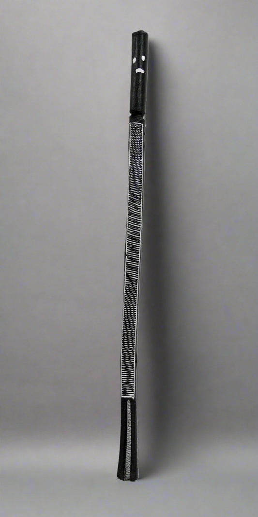 Black and white Mimih Spirit wooden sculpture by Kayleen Namundja.