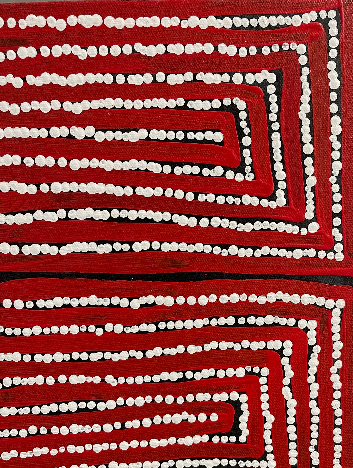 Close-up of a painting by Thomas Tjapaltjarri.