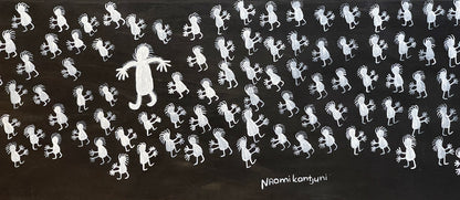 Close-up of a painting on primed linen by Naomi Kantjuriny, featuring a dark background with numerous white figures that represent good and bad spirits.