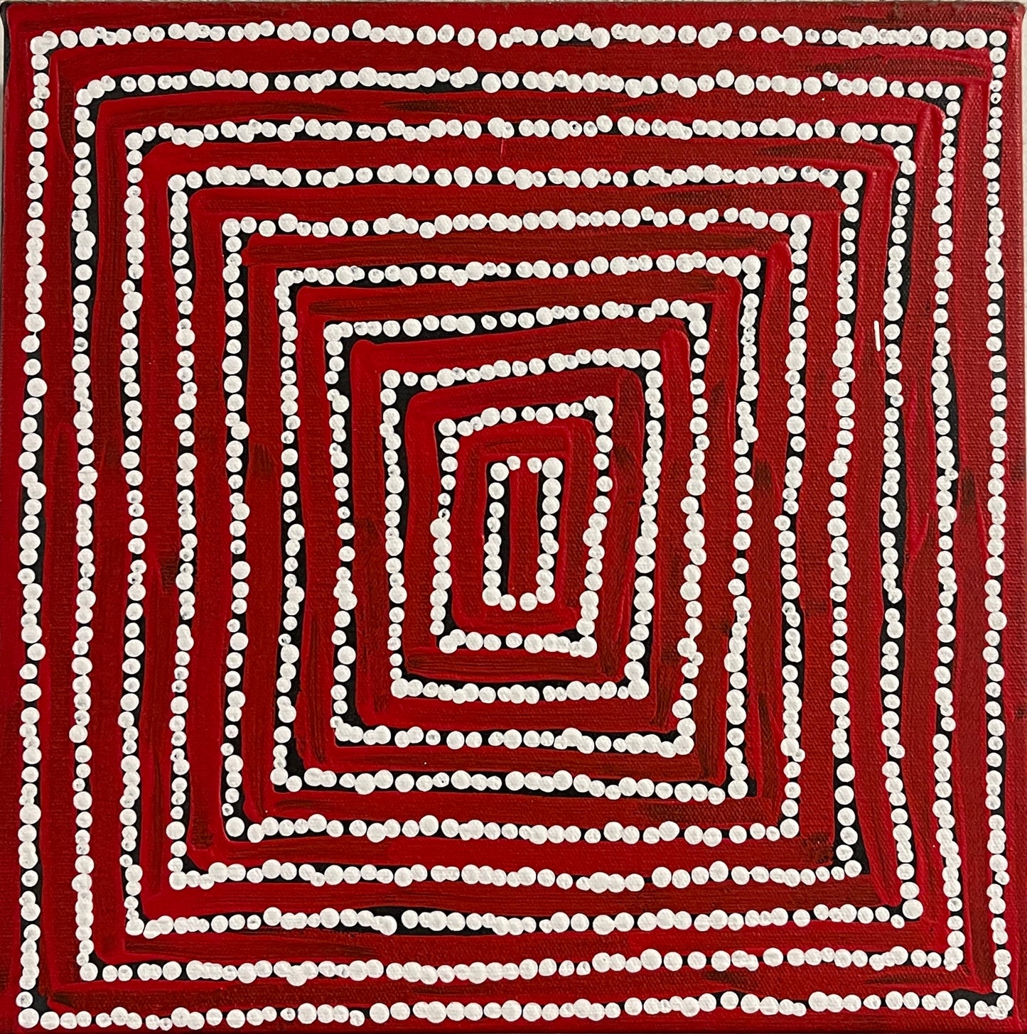 A 30x30cm painting by Thomas Tjapaltjarri showing concentric lines with white dots on a red and black background