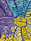 Close-up of painting by Lorna Fencer Napurrula with blue, aqua, yellow, and purple colours.