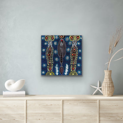 A painting by Colleen Wallace Nungarrayi on a wall above a wooden cabinet.