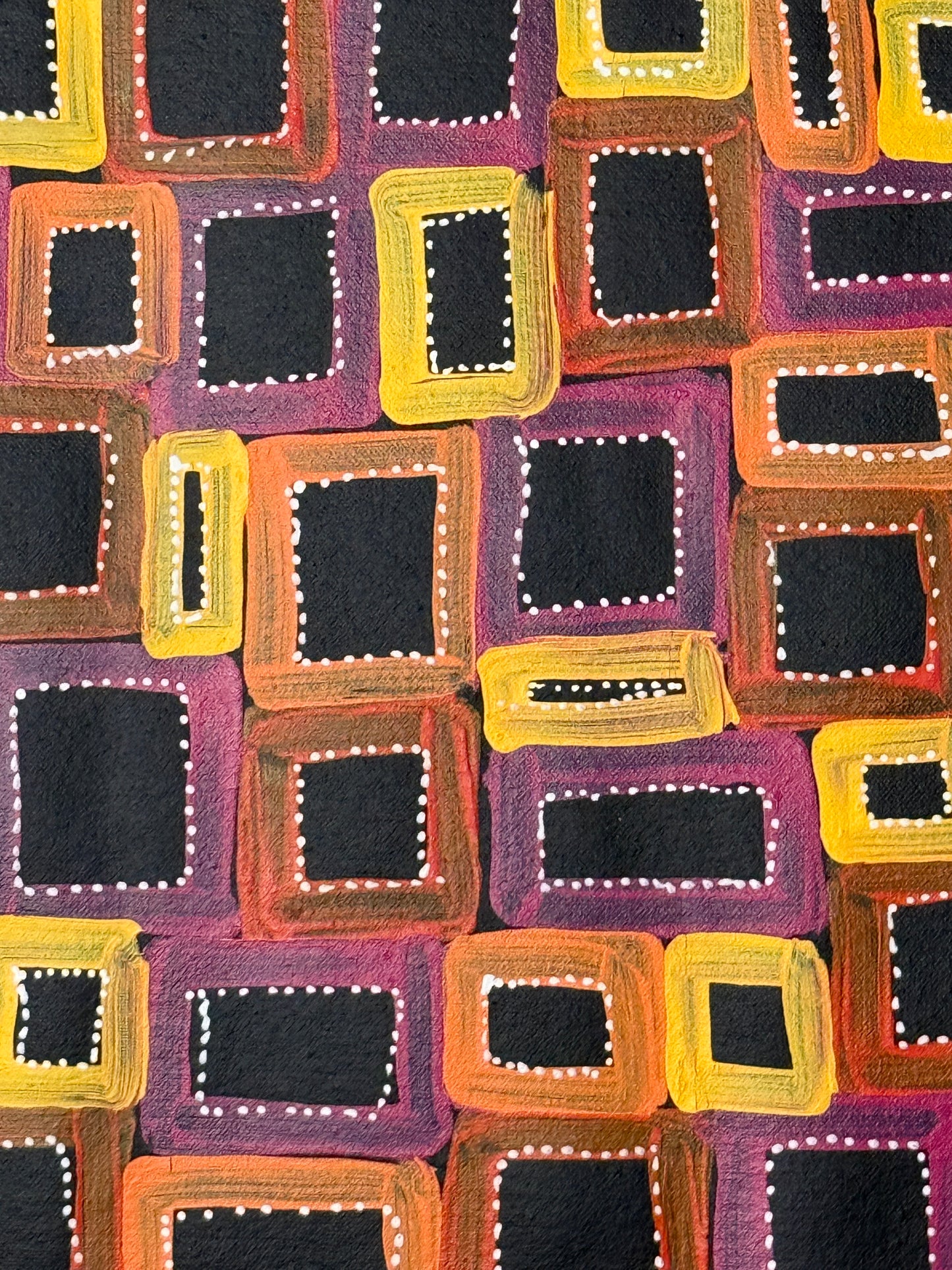 Close-up of a 42x36cm painting Abie Loy Kemarre, representing Awelye with colorful geometric shapes