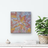 A colorful painting by Bernadine Johnson Kemarre, representing traditional bush medicine plants with decorative items below