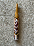 Painted milkwood bird carving by Aboriginal artist Christine Burarrwanga.