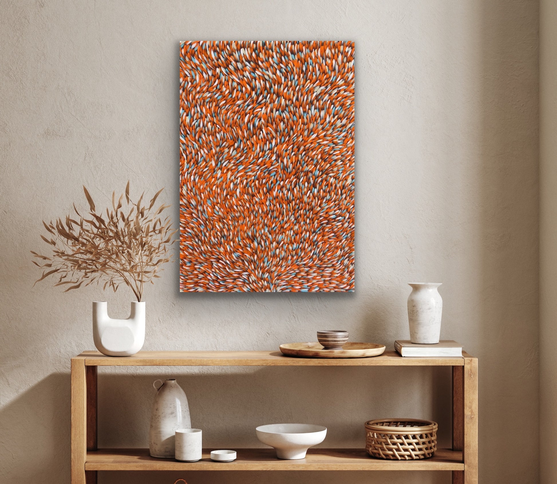 A painting by Gloria Petyarre featuring a pattern of Bush Medicine Leaves in orange, light blue and white on a primed linen canvas.