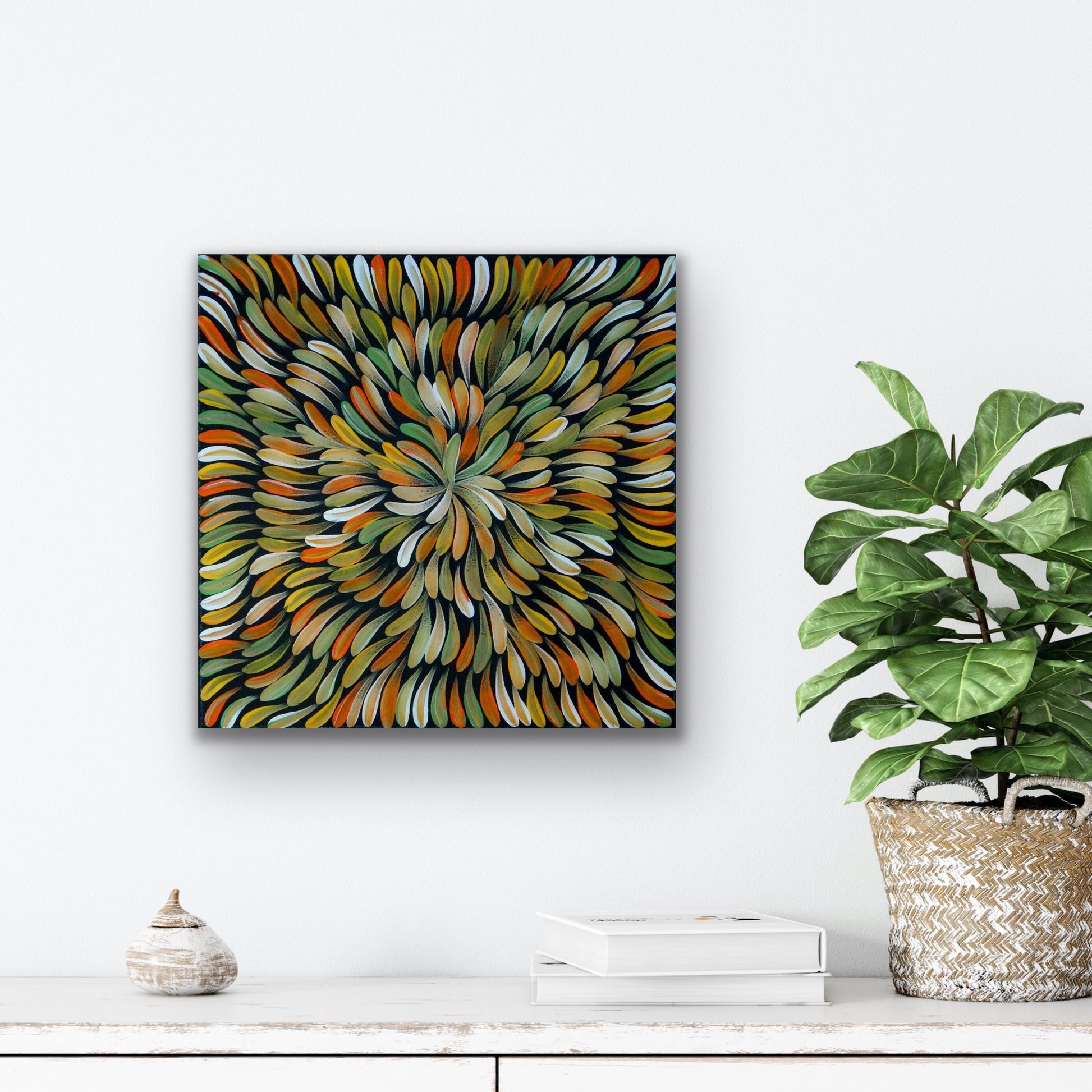 A painting by Mary Rumble featuring a pattern of intertwined leaves in various green, orange and white colours.
