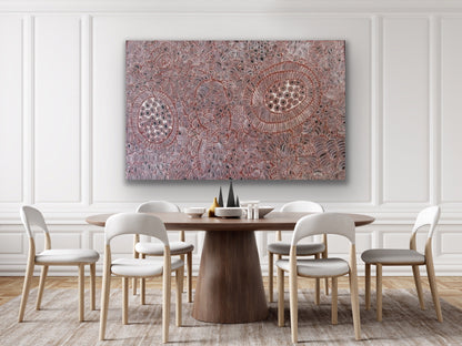 Dining room with a large painting by Tjawina Porter Nampitjinpa on the wall.