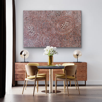 A dining room with a painting by Tjawina Porter Nampitjinpa and table setting.