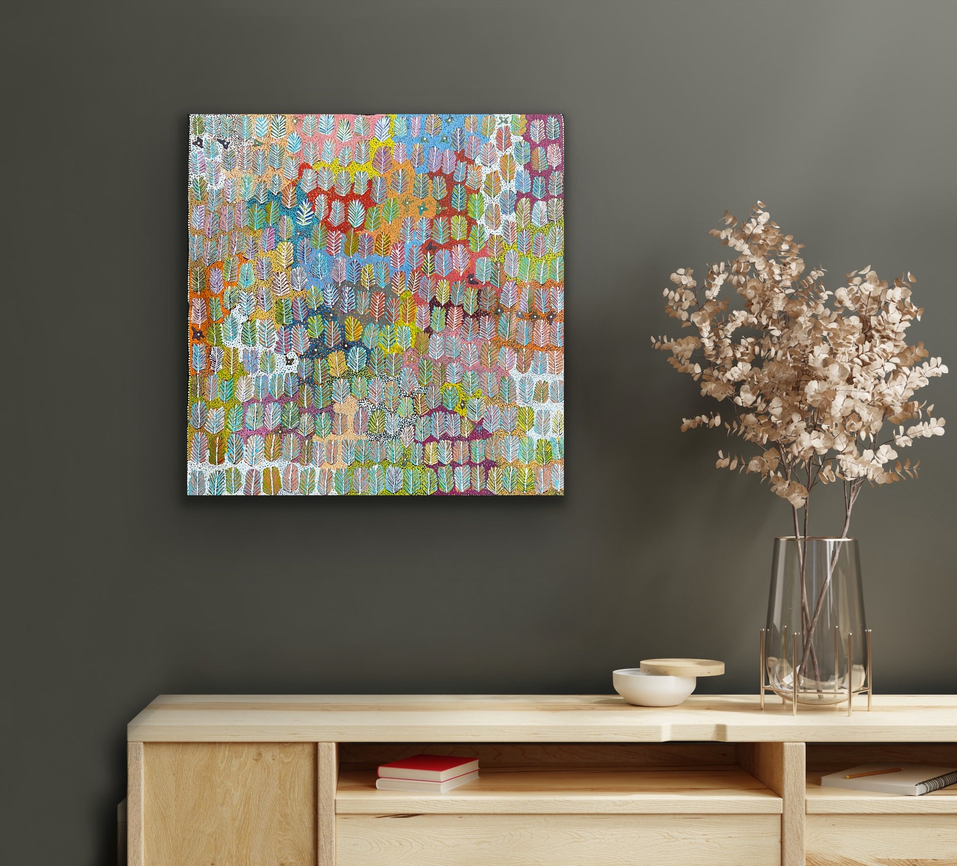 A colourful abstract painting by Betty Morton featuring a pattern of leaf-like shapes in a variety of colours.