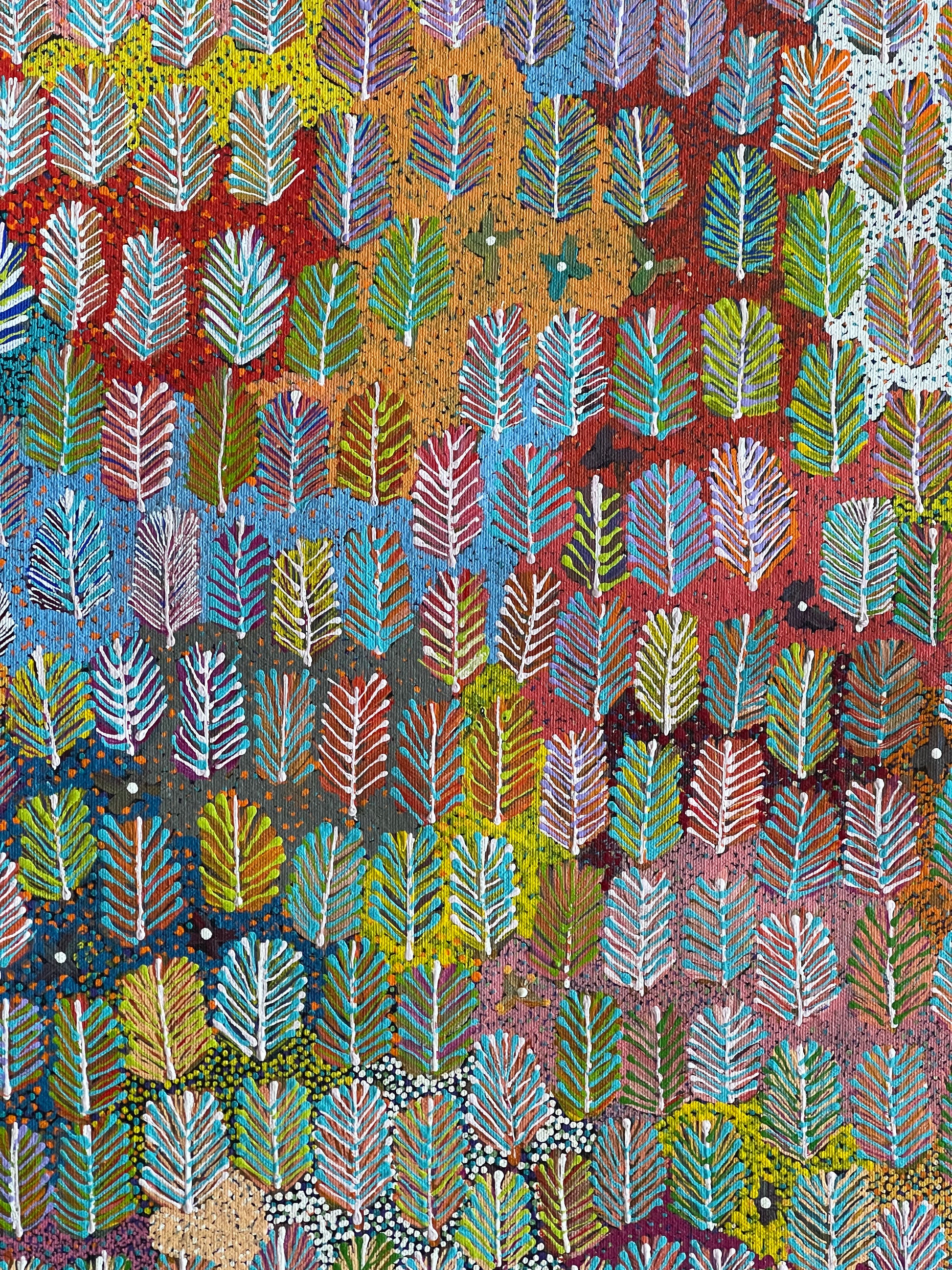Close-up of a colourful painting by Betty Morton featuring a pattern of leaf-like shapes in a variety of colours.
