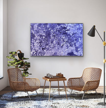 A canvas painting featuring an abstract pattern of purple tones, representing the 'Bush Plum Dreaming' artwork by Polly Ngale.