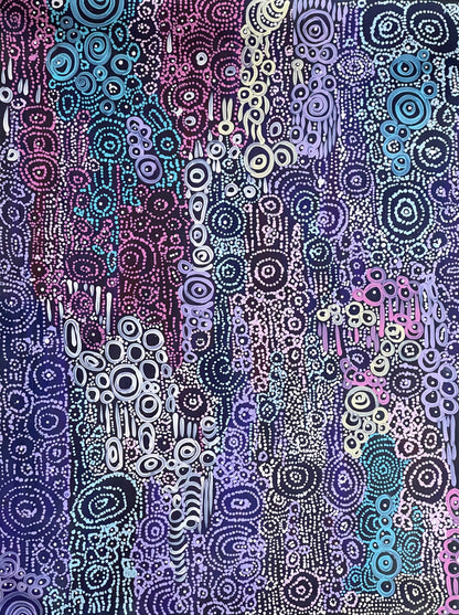 A painting by Meredith Curley featuring a pattern of swirling circles in various shades of blue, purple, pink and white on a black background.