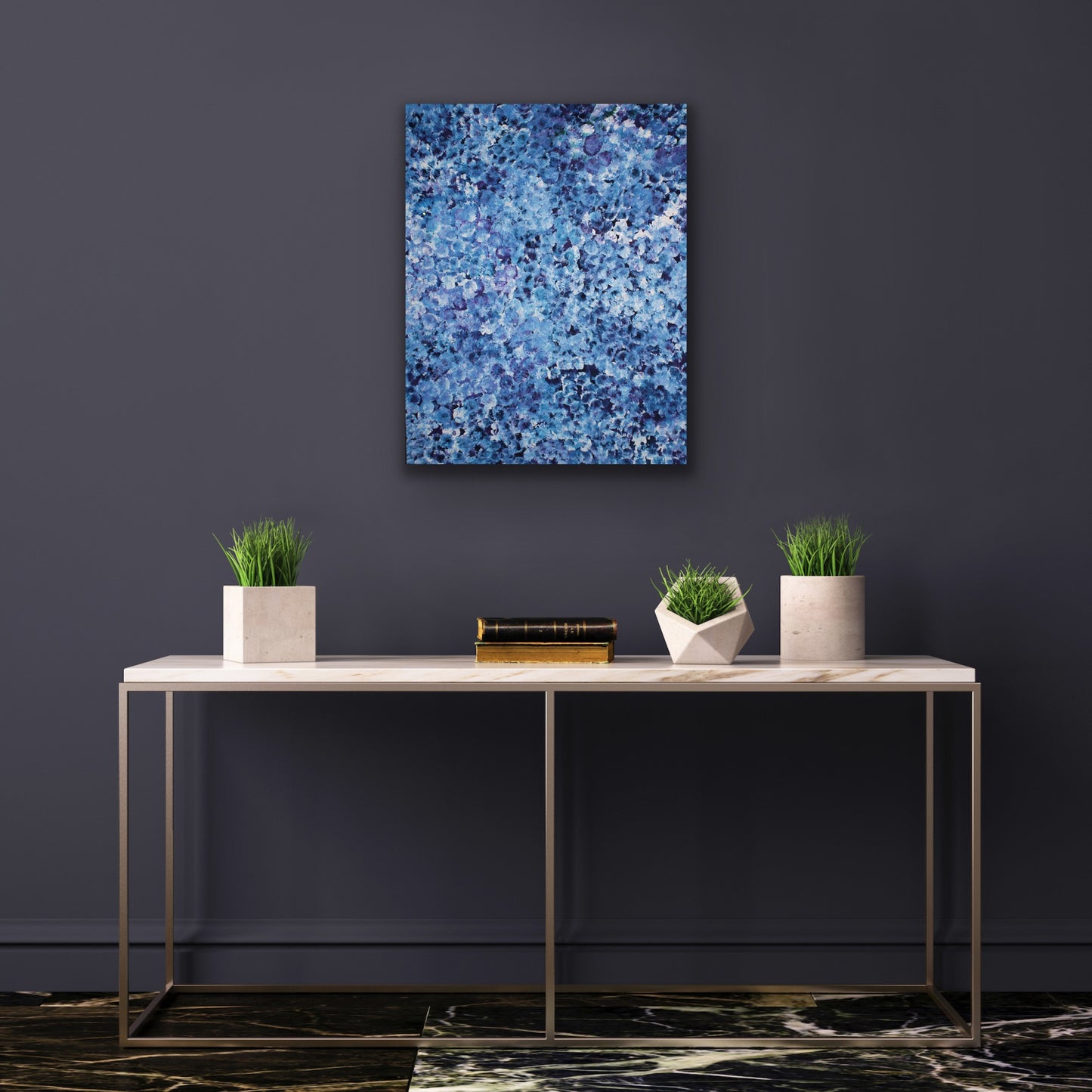 A canvas painting featuring an abstract pattern of blue tones, representing the 'Bush Plum Dreaming' artwork by Polly Ngale.