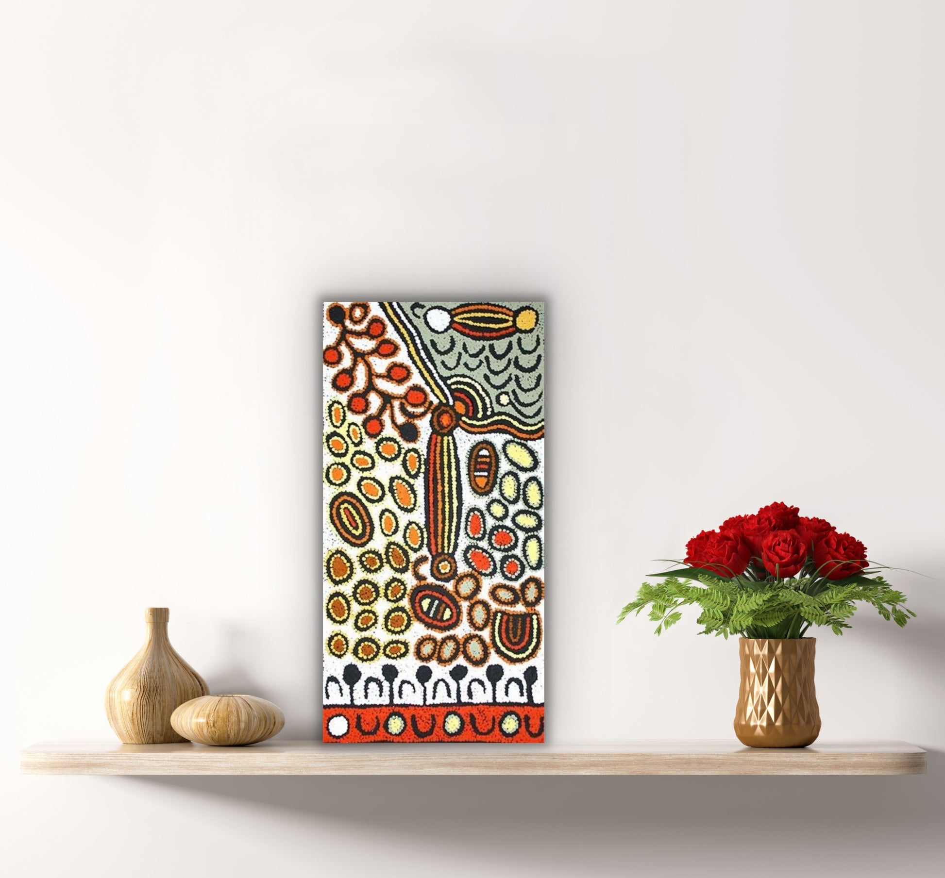 Daphne Larry Nampitjinpa holding her 'My Country' painting 30x60cm