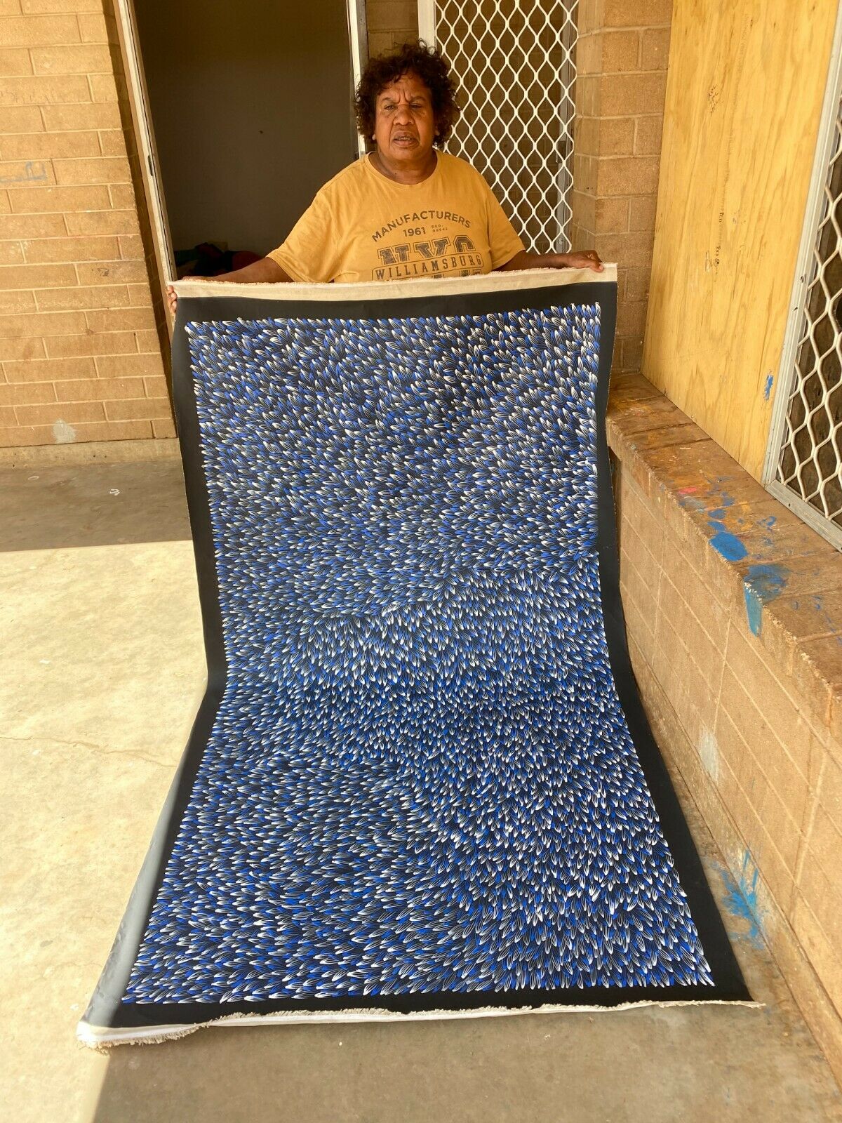 Abie Loy Kemarre holding Bush Medicine Leaf painting Blue, Black and White, 110x200cm